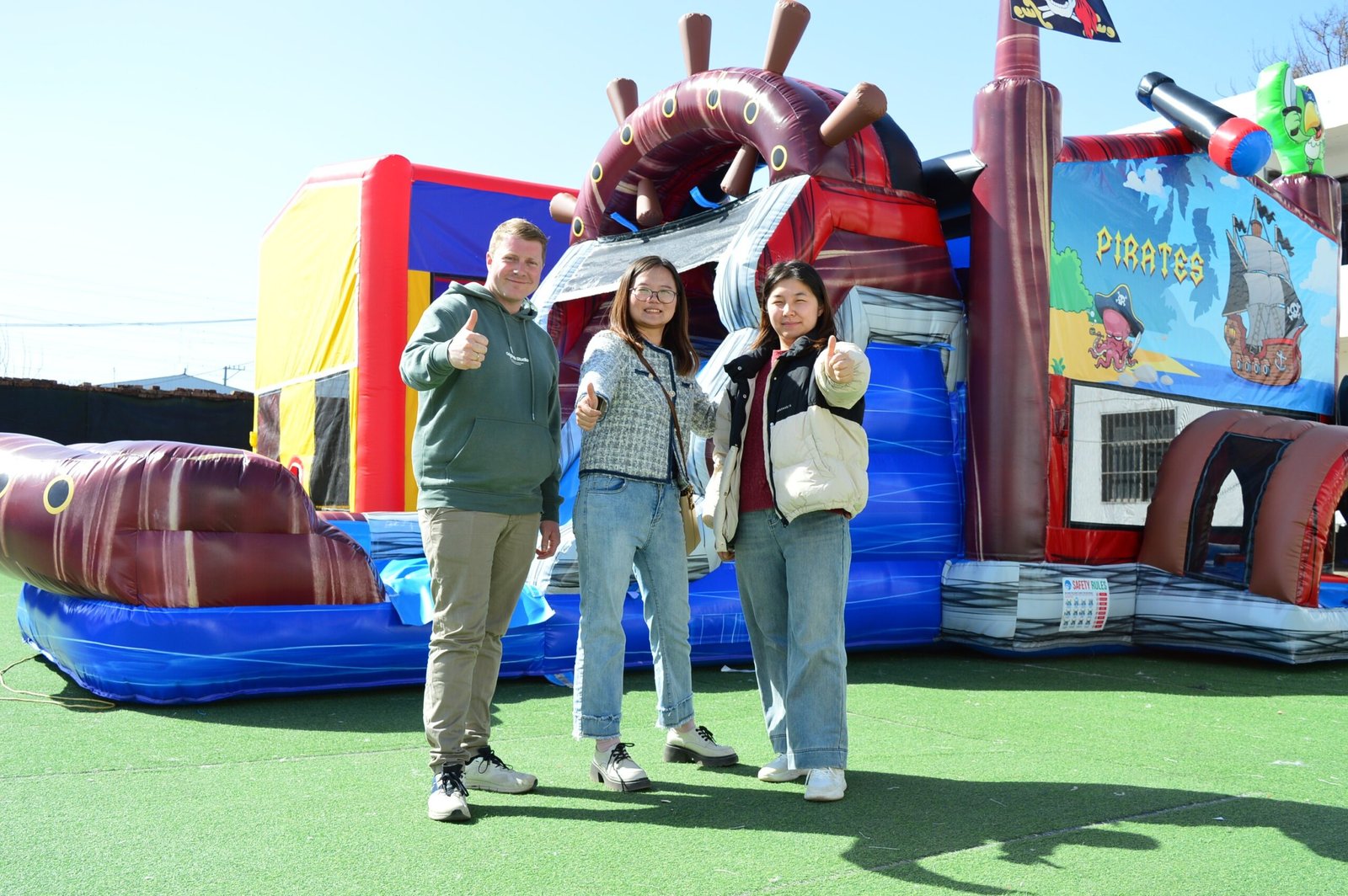 Team at pirate castle inflatable